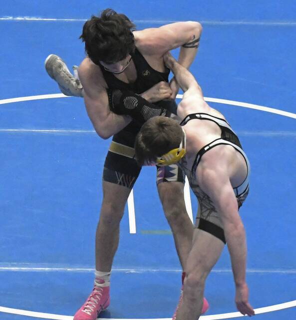 Butler senior Santino Sloboda takes down Penn-Traffords Like DeSantis during a quarterfinal round match at the WPIAL Class 3A championships Feb. 20, 2026. (Paul Schofield | TribLive)