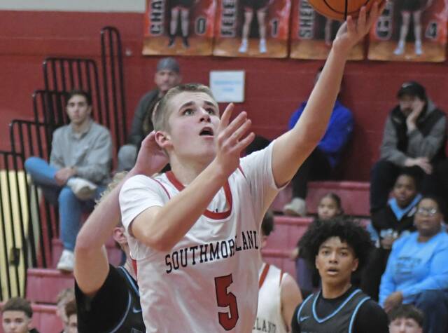 Southmoreland sophomore Brock Pritts hits layup in a WPIAL Class 3A playoff game against Washington on Feb. 17. (Paul Schofield | TribLive)