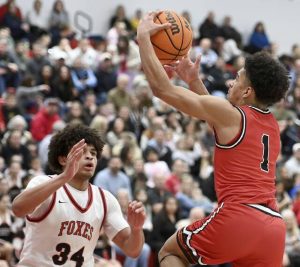 New Castle’s Marino Graham scores against Fox Chapel’s Carson Rihn during their game on Friday, Jan. 9, 2026 at Fox Chapel. (Christopher Horner | TribLive)