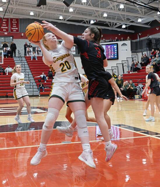 Blackhawks Aubree Hupp goes up for a shot as Elizabeth Forwards Mia Sosataric defends in the WPIAL Class 4A semifinals Monday, Feb. 23, 2026. (Floyd Kish | Mon Valley Independent)