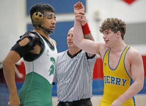 Derrys Mason Horwat gets his hand raised after pinning Laurels Domenic Willis during the 172-pound WPIAL Class 2A championship match Feb. 21 at Chartiers Valley. (Josh Rizzo | For TribLive)
