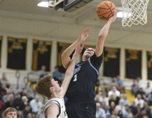 Central Valleys Angelo Conti scores against Knoch in the WPIAL Class 4A quarterfinals Feb. 17. (Chaz Palla | TribLive)