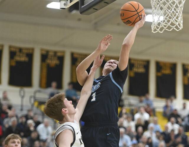 Central Valleys Angelo Conti scores against Knoch in the WPIAL Class 4A quarterfinals Feb. 17. (Chaz Palla | TribLive)