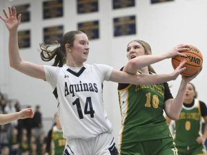 Geibel Catholics Mallory Clemmer grabs a rebound from Aquinas Academys Katie Tarquinio during the WPIAL Class A semifinals Feb. 23, 2026 at Norwin High School. (Chaz Palla | TribLive)