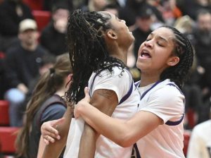 Winchester-Thurstons Aleah Cooper (right) hugs DaShae Cochran after Cochran scored an and-one against Chartiers-Houston during the WPIAL Class 2A semifinals Feb. 24, 2026 at Peters Twp. High School. (Chaz Palla | TribLive)