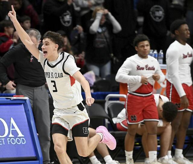 Upper St. Clair’s Jake Foster celebrates after defeating New Castle, 52-51, in the WPIAL Class 6A championship game on Friday, Feb. 27, 2026, at Petersen Events Center. (Christopher Horner | TribLive)