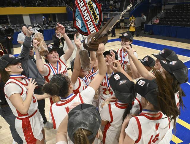 Neshannock celebrates with the trophy after beating Winchester Thurston during the WPIAL Class 2A girls basketball championships Saturday, Feb. 28, 2026 at Petersen Events Center. (Chaz Palla | TribLive)
