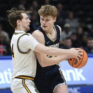 Knoch’s Liam Avon works against Quaker Valley’s Kolton Johnson during the WPIAL Class 4A championship game on Thursday, Feb. 26, 2026, at Petersen Events Center. (Christopher Horner | TribLive)