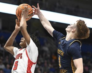Aliquippas Qalil Goode fights for a rebound with South Alleghenys Fischer Ielase during the WPIAL 2A basketball Championships on Saturday at Petersen Events Center. (Chaz Palla | TribLive)
