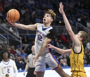 Chartiers Valley’s Julian Semplice scores against Thomas Jefferson during the WPIAL Class 5A championship game on Saturday, Feb. 28, 2026, at Petersen Events Center. (Christopher Horner | TribLive)