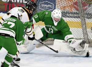 South Fayette goaltender Jackson Ankrum makes a glove save on North Alleghenys Kyle Imm during a PIHL Class 3A semifinal March 10, 2025. (Chaz Palla | TribLive)