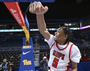 Aliquippas Qalil Goode celebrates after beating South Allegheny during the WPIAL Class 2A basketball championship game Saturday at Petersen Events Center. (Chaz Palla | TribLive)