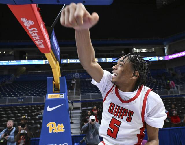 Aliquippas Qalil Goode celebrates after beating South Allegheny during the WPIAL Class 2A basketball championship game Saturday at Petersen Events Center. (Chaz Palla | TribLive)