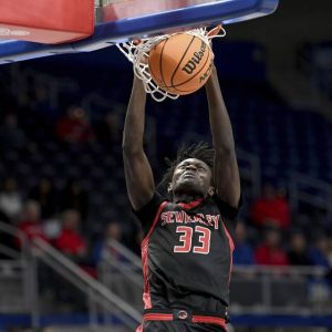 Sewickley Academys Adam Ikamba dunks against Jeannette during the WPIAL Class 2A championship game Feb. 27 at Petersen Events Center. (Christopher Horner | TribLive)