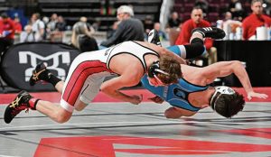 Hempfields Nico Kapusta is slammed to the mat by Landisville Hempfields Joey Gallo during the PIAA 
Class 3A 121-pound quarterfinals Thursday at Giant Center. (Chaz Palla | TribLive)