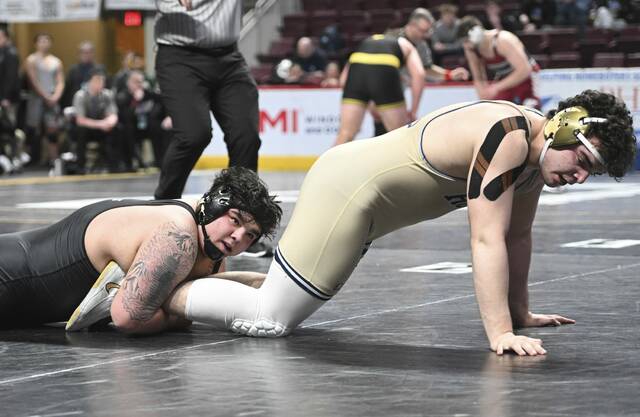 North Alleghenys Bradyn McConneha beats Council Rocks Matthew Scott during a PIAA Class 3A heavyweight quarterfinal Friday at Giant Center. (Chaz Palla | TribLive)