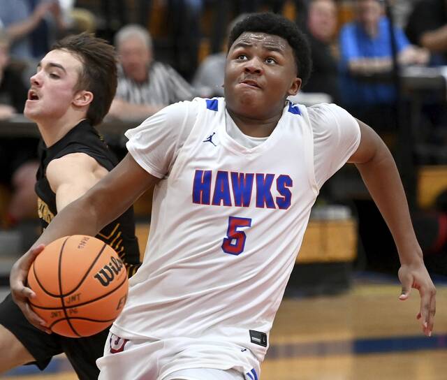 Jeannettes Markus McGowan scores against Northern Cambria during their PIAA Class 2A first-round game Saturday. (Christopher Horner | TribLive)