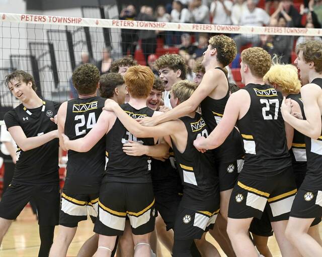 The North Allegheny boys volleyball team celebrates after defeating Seneca Valley in the WPIAL Class 3A championship match on Saturday, May 24, 2025, at Peters Township (Christopher Horner | Triblive)