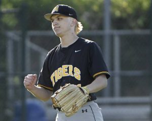North Allegheny closer Nate Surman pumps his fist after getting the final out against Shaler last season. (Photos: Christopher Horner | TribLive)