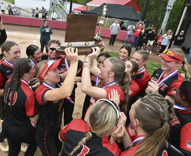 Mohawk celebrates with the trophy after beating South Park during the WPIAL Class 3A softball championships May, 29, 2025 at Lilley Field. (Chaz Palla | TribLive)