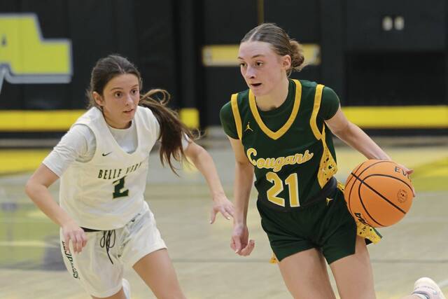 Blackhawks Grace Huston drives on Belle Vernons Abby Russell during the PIAA Class 4A playoffs Wednesday. (Jeff Helsel | Mon Valley Independent)
