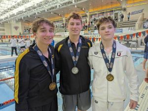 The WPIAL medalists from the PIAA Class 3A boys diving championships March 11, 2026, at Bucknell University were, from left, North Allegheny's Anthony Farrah and Ethan Maravich and Upper St. Clair's Carter Wells. (Michael Love | TribLive)