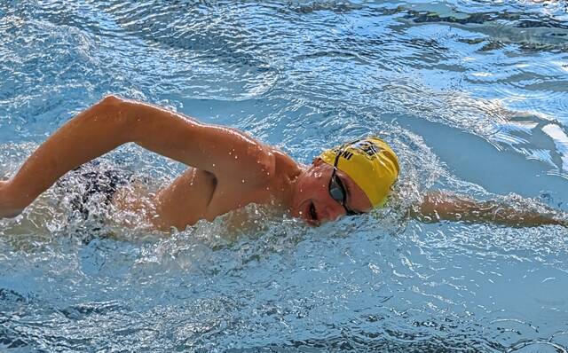 Knoch senior Adrian Lavorini swims freestyle during practice Jan. 30, 2026, at Butler YMCA. (Michael Love | TribLive)
