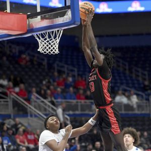 Sewickley Academy’s Adam Ikamba dunks against Jeannette during the WPIAL Class 2A championship game on Friday, Feb. 27, 2026, at Petersen Events Center. (Christopher Horner | TribLive)