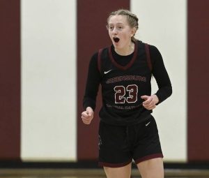 Greensburg Central’s Erica Gribble celebrates after hitting a 3-pointer during the third quarter against Trinity in their PIAA Class 3A state quarterfinal on Friday, Mar. 13, 2026, at Altoona. (Christopher Horner | TribLive)