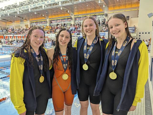 Freshman Elyse Brenenborg, freshman Ella Kiger, junior Ava Jochims and freshman Rachael Bummer won the 200 medley relay for Shady Side Academy at the PIAA Class 2A swimming championships Friday, March 13, 2026. (Michael Love | TribLive)