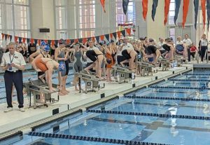 Swimmers take the blocks during the PIAA Class 2A 400-yard relay girls prelims March 14, 2026, at Bucknell. (Michael Love | TribLive)
