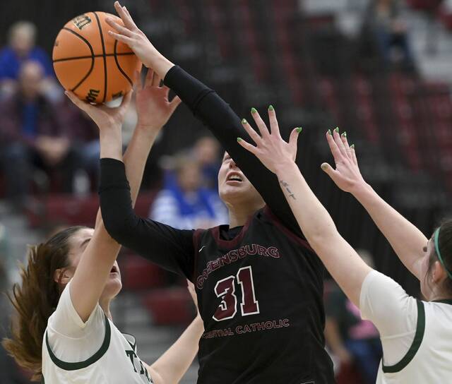 Greensburg Centrals Avery Jones scores against Trinity during their PIAA Class 3A quarterfinal on Friday, March 13, 2026, at Altoona. (Christopher Horner | TribLive)