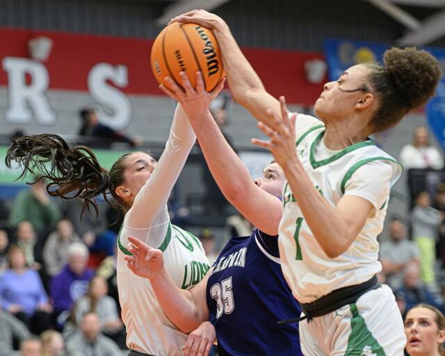 South Fayette's Lailah Wright (1) and Juliette Leroux (14) contest a shot from Baldwin's Hannah Prilla (35) in the PIAA Class 5A quarterfinals Saturday, March 14 at Peters Township. (Andrew Palla | For TribLive)
