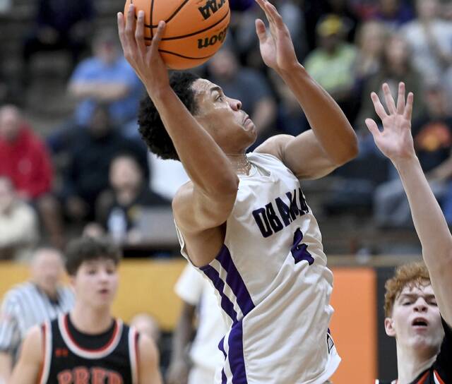 Obama Academy’s Naron Jackson scores against Cathedral Prep during their PIAA Class 4A state playoff game on Tuesday, Mar. 10, 2026, at Sharon High School. (Christopher Horner | TribLive)