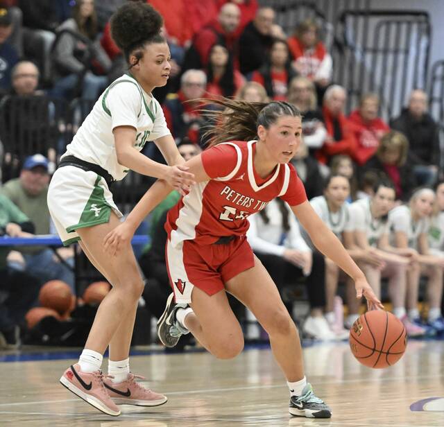 Peters Townships Taylor McCullough gets around South Fayettes Lailah Wright during the 2025 PIAA Class 5A semifinals at Canon-McMillan. (Chaz Palla | TribLive)