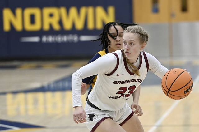 Greensburg Central’s Erica Gribble drives past Shady Side Academy’s Karis Thomas during their PIAA Class 3A state semifinal on Monday, Mar. 16, 2026, at Norwin. (Christopher Horner | TribLive)