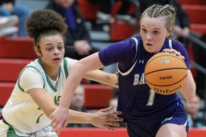 Baldwins Lynsey Bernotas (right) looks for room to drive against South Fayettes Lailah Wright (left) in the PIAA Class 5A quarterfinals March 14 at Peters Township. (Andrew Palla | For TribLive)
