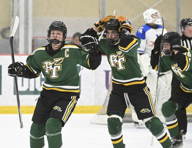 Penn-Traffords Ben Zierski celebrates his goal on the Fake Michigan play against Hempfield during the PIHL Class 2A championship game Monday at UPMC Lemieux Sports Complex. (Chaz Palla | TribLive)