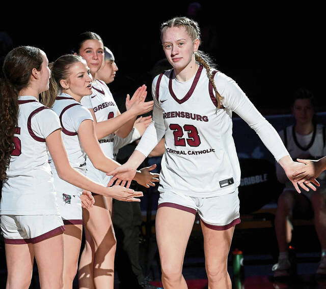 Greensburg Central’s Erica Gribble takes the court during player introductions before the PIAA Class 3A state championship game on Thursday, Mar. 19, 2026, at Giant Center in Hershey. (Christopher Horner | TribLive)