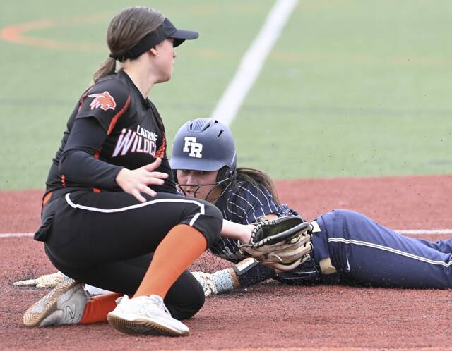 Latrobes Natalia Scekeres applies a tag to Franklin Regionals Ciara Camacho last season. (Chaz Palla | TribLive)