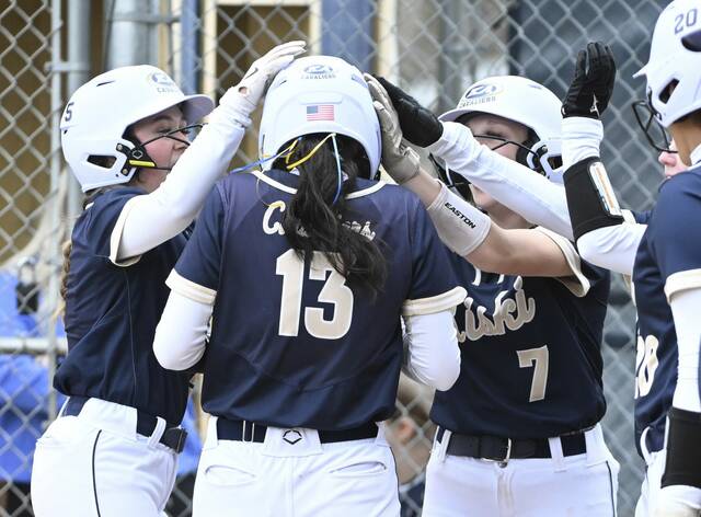 Kiski Area celebrates with Alyssa Perona after her home run against Franklin Regional last season. (Chaz Palla | TribLive)