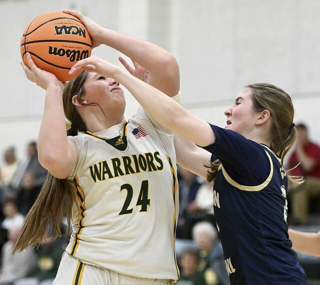 Penn-Trafford’s Torrie DeStefano drives to the basket against Franklin Regional’s Madelyn Catello on Wednesday, Jan. 21, 2026, in Harrison City. (Christopher Horner | TribLive)