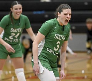 South Fayette’s Haylie Lamonde and Ryan Oldaker celebrate with Hershey’s kisses after defeating Peters Twp. in their PIAA Class 5A state semifinal on Tuesday, Mar. 17, 2026, at Bethel Park. (Christopher Horner | TribLive)
