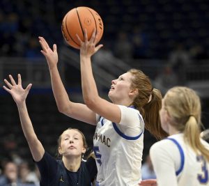 Canon-McMillan’s Madison Clair scores against Norwin during the WPIAL Class 6A championship game on Saturday, Feb. 28, 2026, at Petersen Events Center. (Christopher Horner | TribLive)