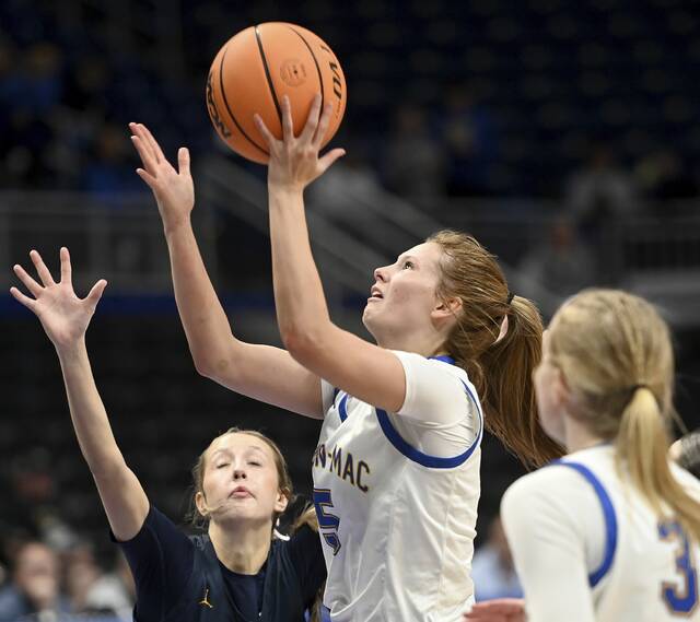Canon-McMillan’s Madison Clair scores against Norwin during the WPIAL Class 6A championship game on Saturday, Feb. 28, 2026, at Petersen Events Center. (Christopher Horner | TribLive)