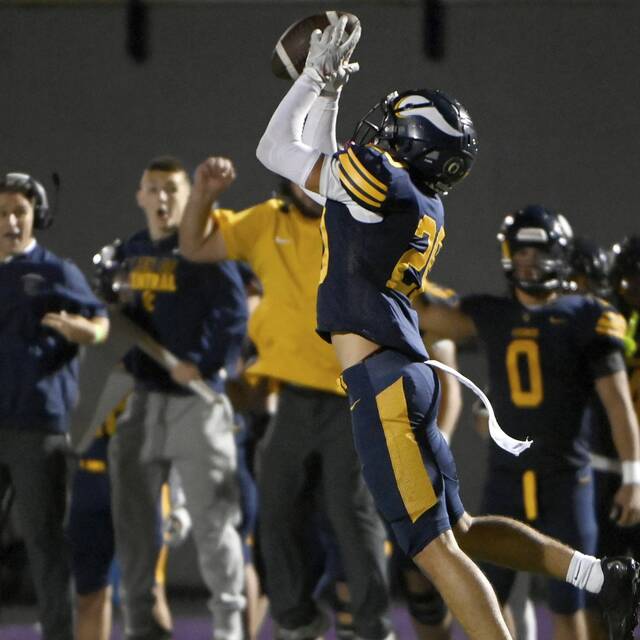 Central Catholics Zac Gleason intercepts a pass against North Allegheny on Friday, Sept. 27, 2024, at Baldwin High School. (Christopher Horner | TribLive)