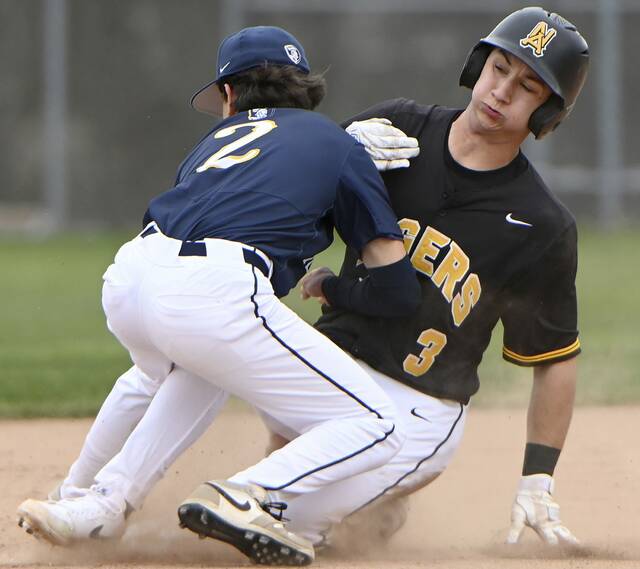 North Alleghenys JJ Mancuso collides with Norwins Dante Marino while stealing second base March 25. (Christopher Horner | TribLive)
