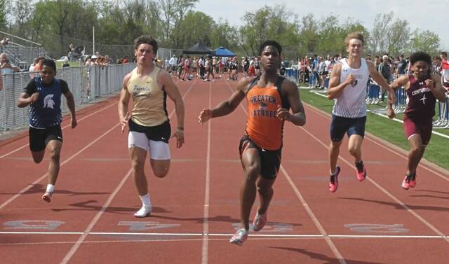 Latrobes Preston Miller wins the 100-meter dash at the Westmoreland County Coaches Association meet Thursday. (Paul Schofield | TribLive)
