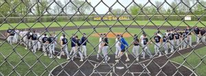 Norwin and Mt. Lebanon players go through the handshake line Monday after Norwin's 11-4 win in North Huntingdon. (Bill Beckner Jr. | TribLive)
