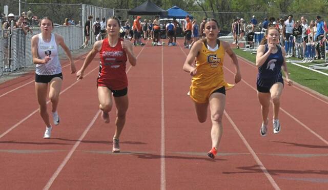 Greensburg Salem's Isabella Dinkel wins the 100-meter dash at the Westmoreland County Coaches' Assocaition meet on April 23, 2026. (Paul Schofield | TribLive)